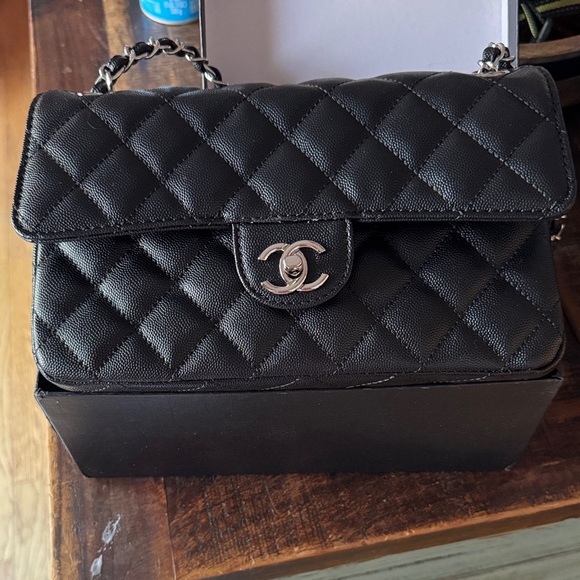 CHANEL Handbags - CHANEL Black Quilted Flap Shoulder Bag with Silver Hardware